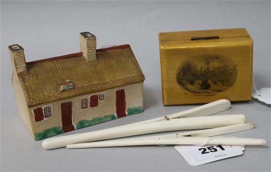 A Willows Art china Langton porcelain model of Robert Burns cottage; a Mauchlineware box and 2 Edwardian glove stretchers
